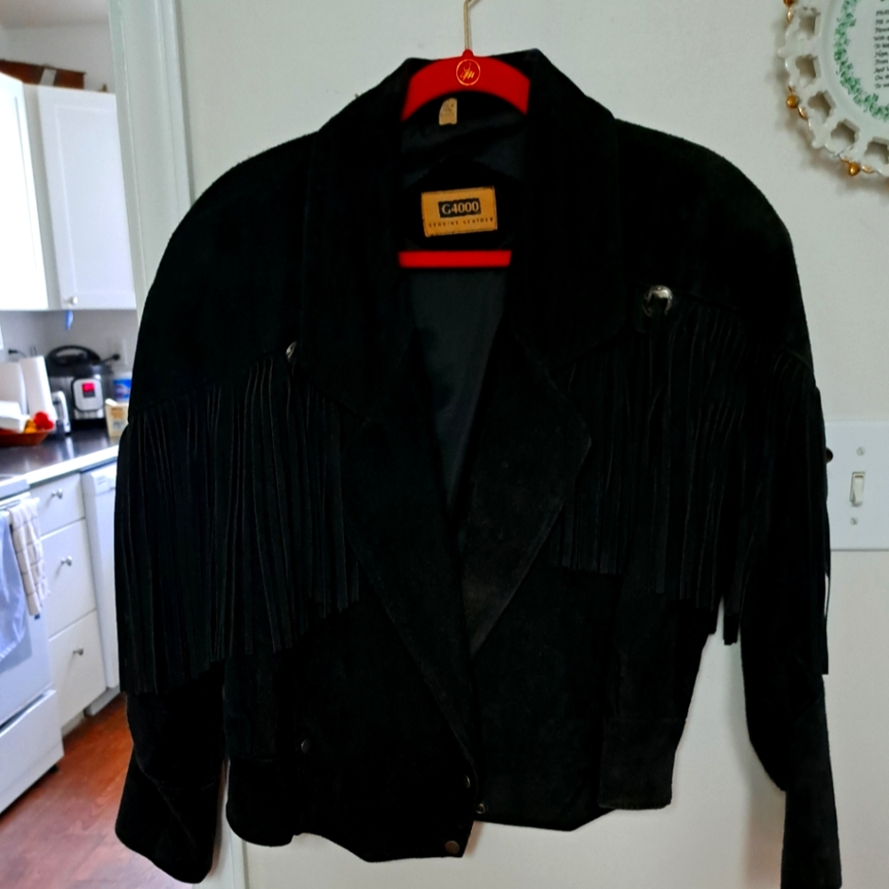 Like new condition. Black suade/leather waist jacket